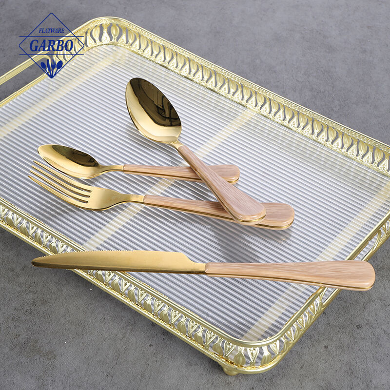 Gold 410 flatware sets china factory with wooden design plastic handle 