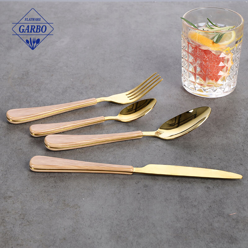 Gold 410 flatware sets china factory with wooden design plastic handle 