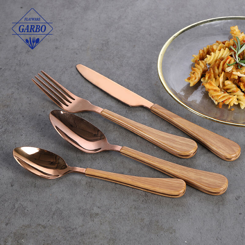 Factory direct sale new design rose gold cutlery set with wood printing plastic handle