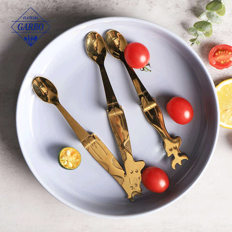 Il cucchiaio per bambini all'ingrosso della fabbrica cinese ha messo le piccole posate del cucchiaio del dessert dell'oro