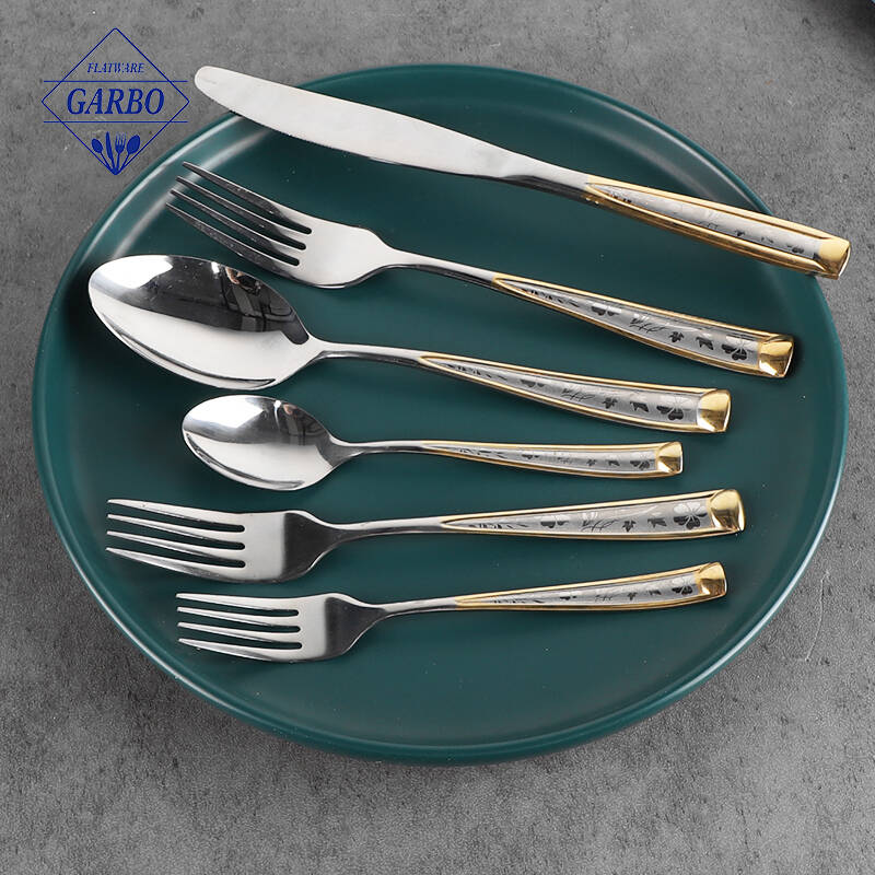 Competitive price 410 stainless steel creative flower pattern with gold rim handle cutlery set