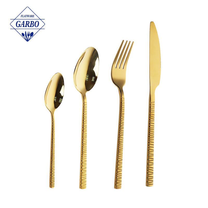 Gold color flatware sets with embossed handle wholesaler