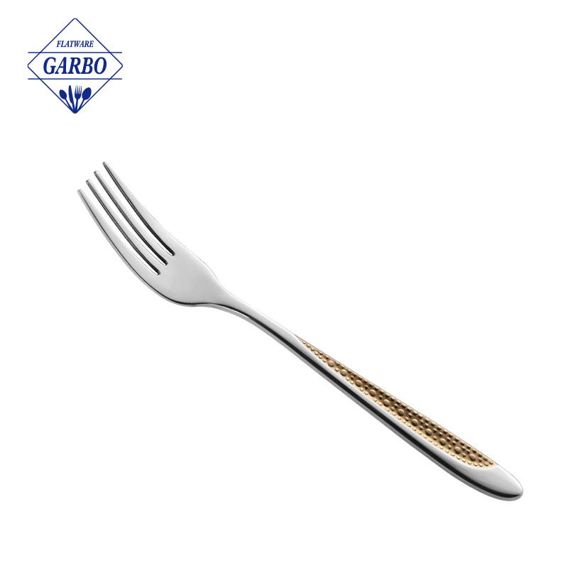 China silver stainless steel dinner fork with a golden electroplated handle