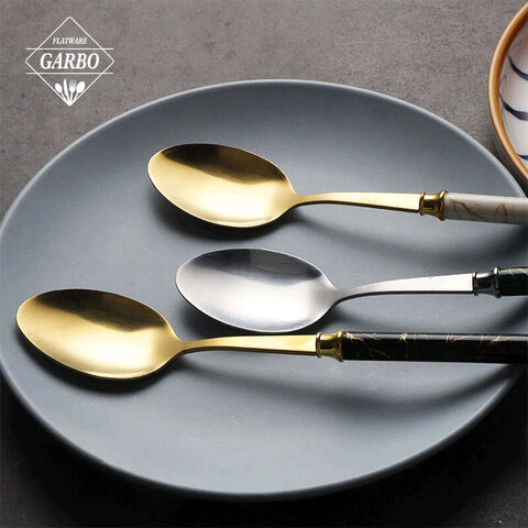 Cuchara de cena de acero inoxidable con mango de cerámica de alta gama de nuevo diseño