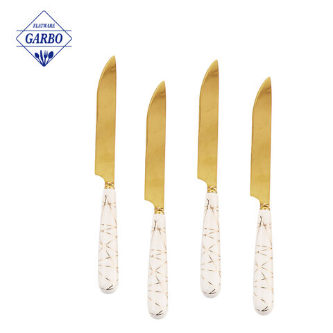 Couteau de dîner de vaisselle de couleur dorée de luxe de galvanoplastie en gros avec poignée en céramique