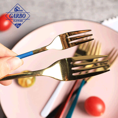 El logotipo diseña la cena Frok del acero inoxidable con la manija coloreada