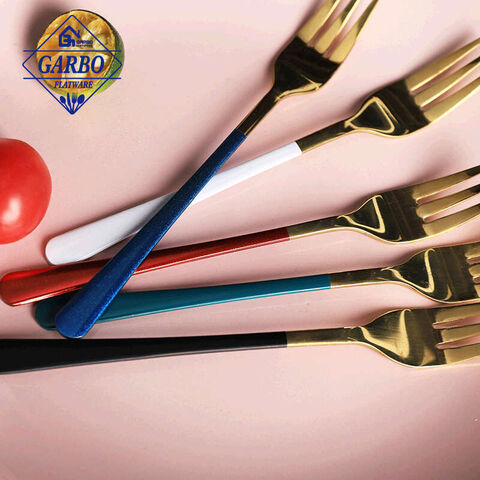 El logotipo diseña la cena Frok del acero inoxidable con la manija coloreada