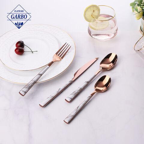 Rose gold color cutlery set with ABS marble design plastic handle tableware.