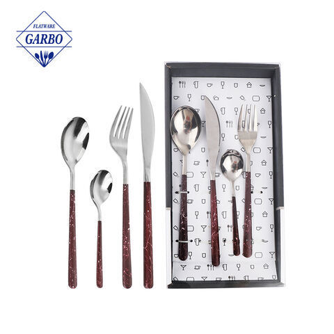 Stainless steel flatware set with spray marble design handle