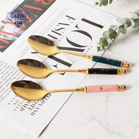 Gold PVD stainless steel dinner spoon with ceramic handle