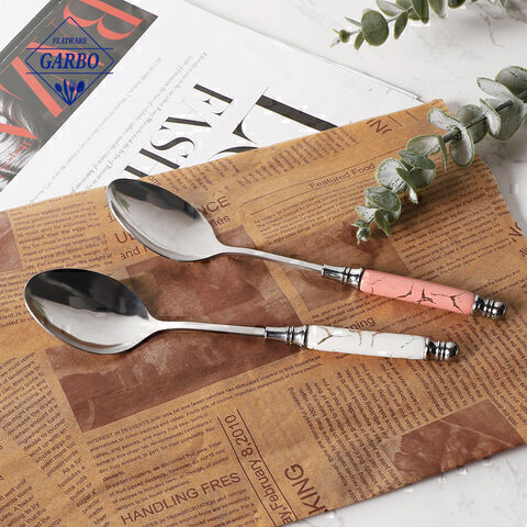 Gold PVD stainless steel dinner spoon with ceramic handle
