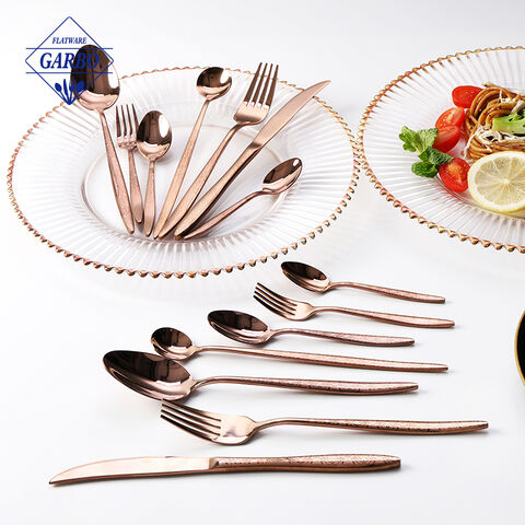 7 قطعة من أدوات المائدة المصنوعة من الفولاذ المقاوم للصدأ باللون الذهبي الوردي PVD المصنوعة في الصين بمقبض باتيرن بالليزر