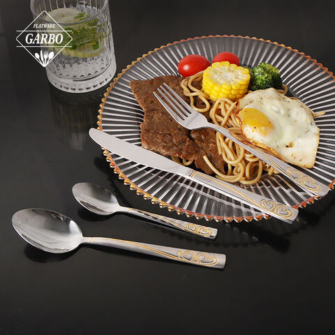 Stainless steel 18/2 flatware set with heart shape emboosed design on handle