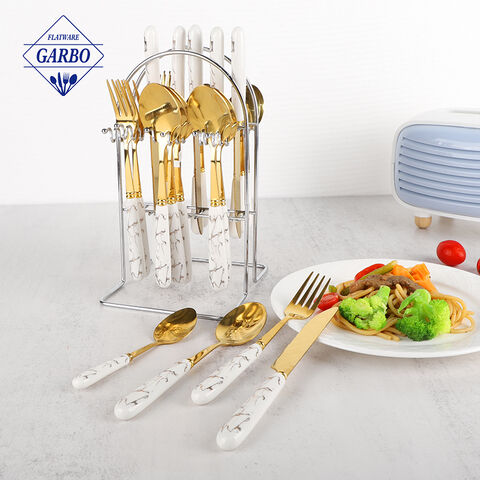 Set peralatan makan stainless steel 24 potong dengan gagang keramik dan dudukan warna perak