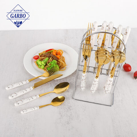 Set peralatan makan stainless steel 24 potong dengan gagang keramik dan dudukan warna perak