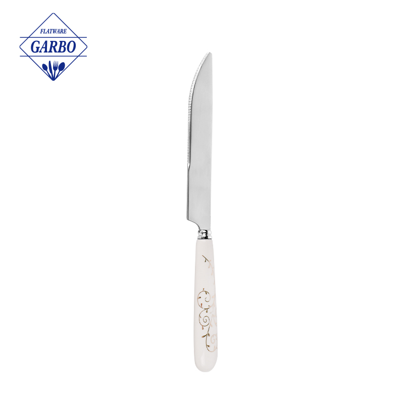 Couteau de dîner pointu en acier inoxydable avec poignée en céramique blanche de gros