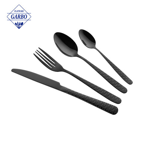 Luxury golden stainless steel cutlery set with embossed and black color handle