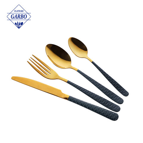 Luxury golden stainless steel cutlery set with embossed and black color handle