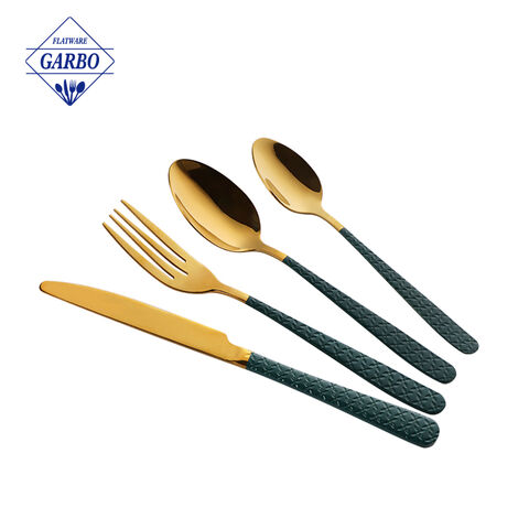 Luxury golden stainless steel cutlery set with embossed and black color handle
