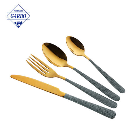 Luxury golden stainless steel cutlery set with embossed and black color handle