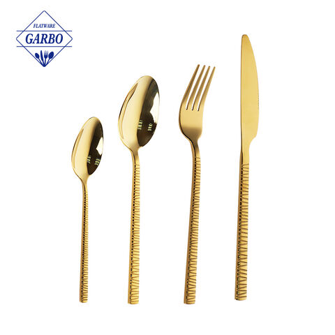 Gold color flatware sets with embossed handle wholesaler 