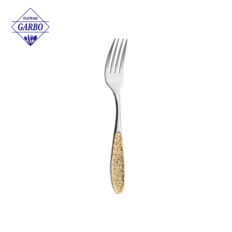 Dinner fork with gold-plated