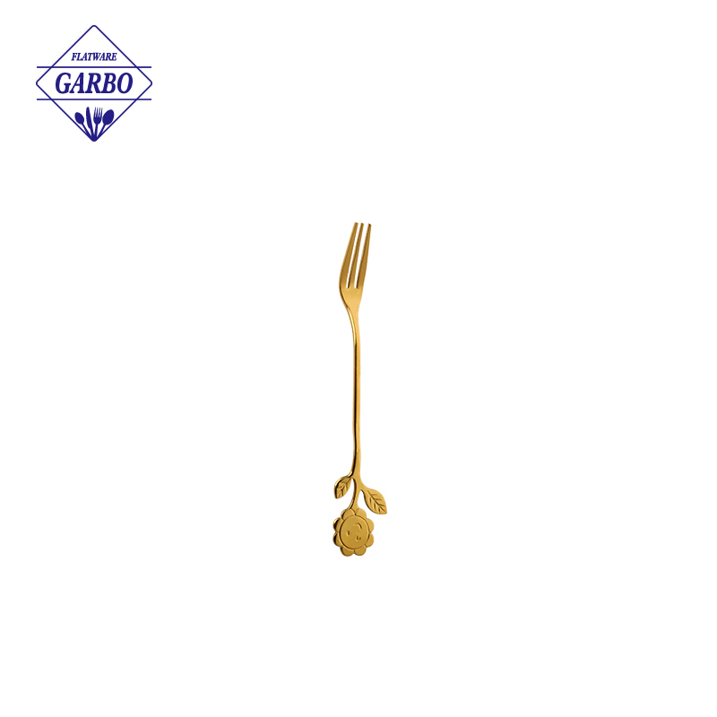 Gold color stainless steel tea fork with flower design